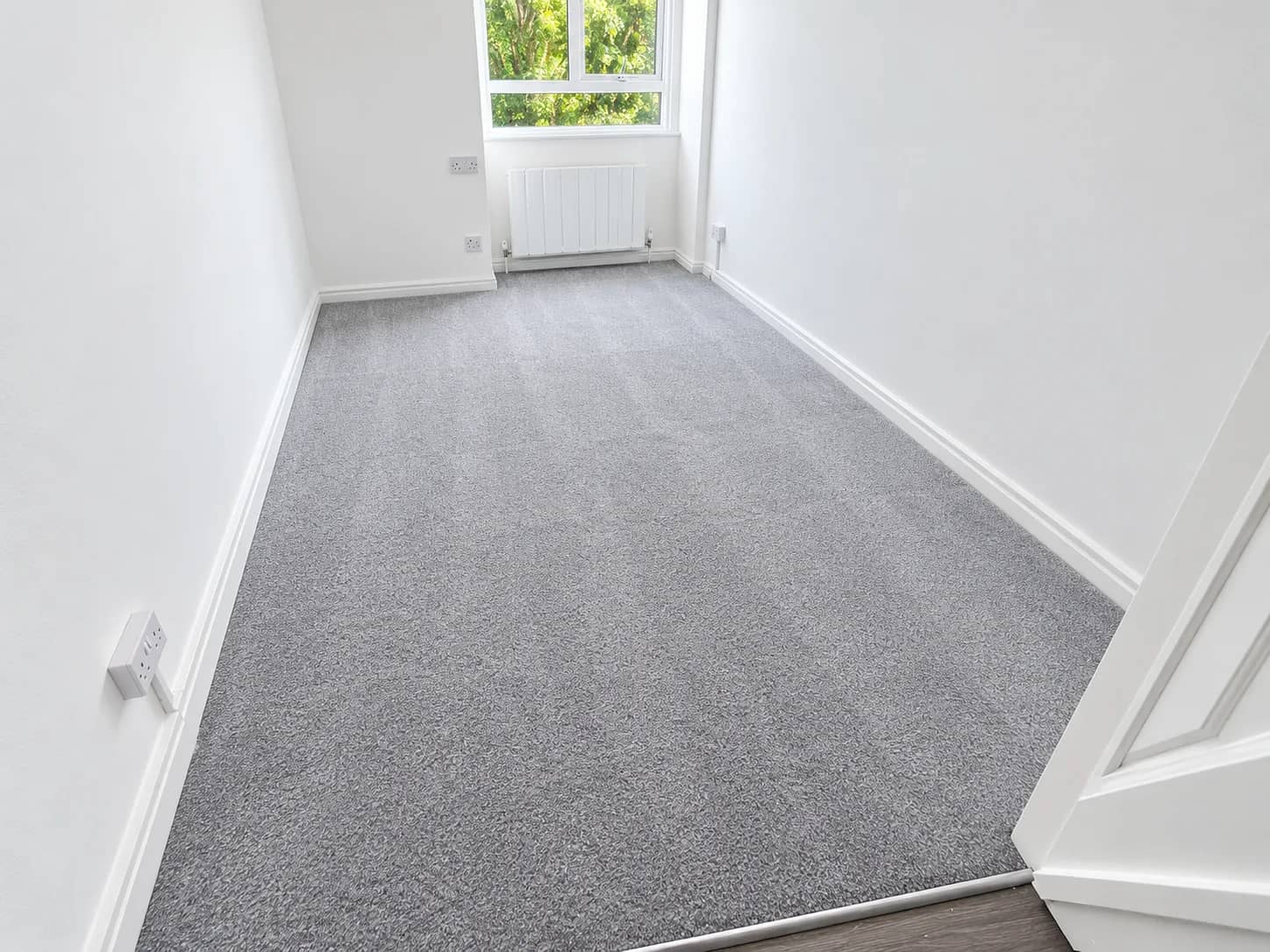 A grey lounge carpet left clean and dry after cleaning.
