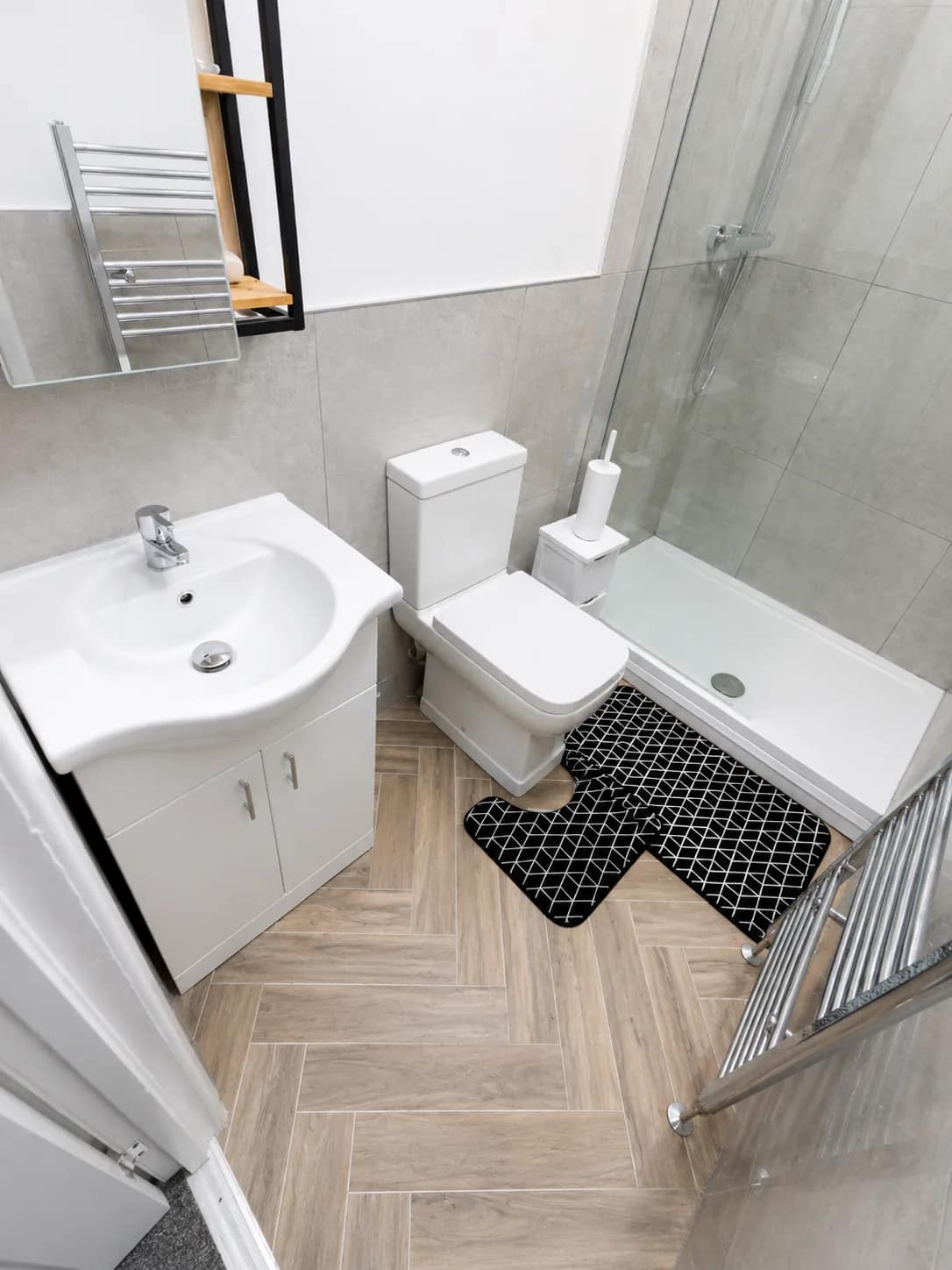 Compact bathroom and shower room after detailed cleaning.